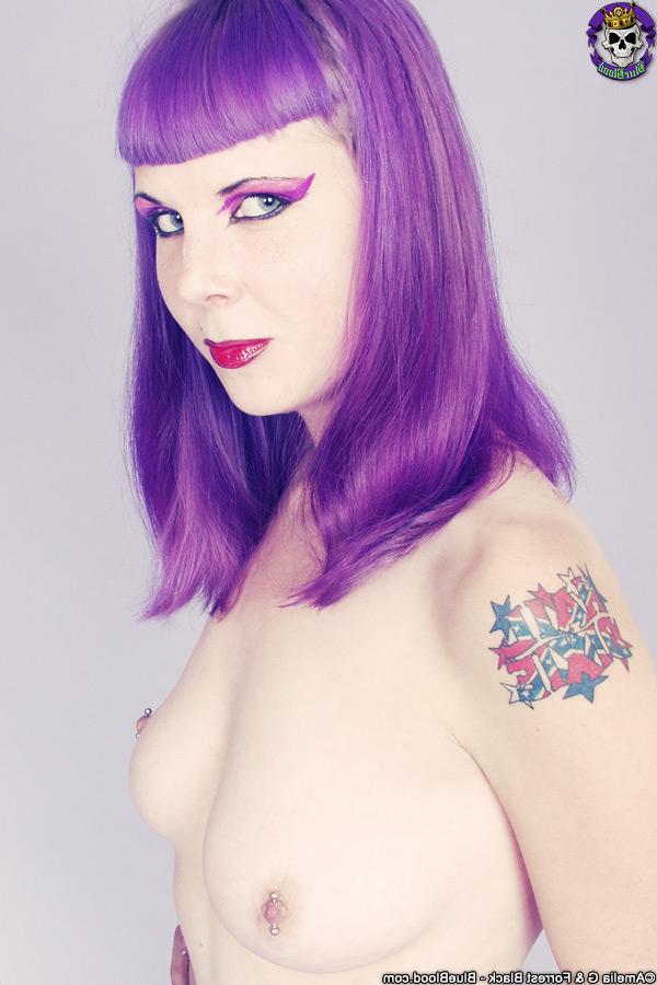 15P Goth girl Szandora wields a blade while going topless in a skirt