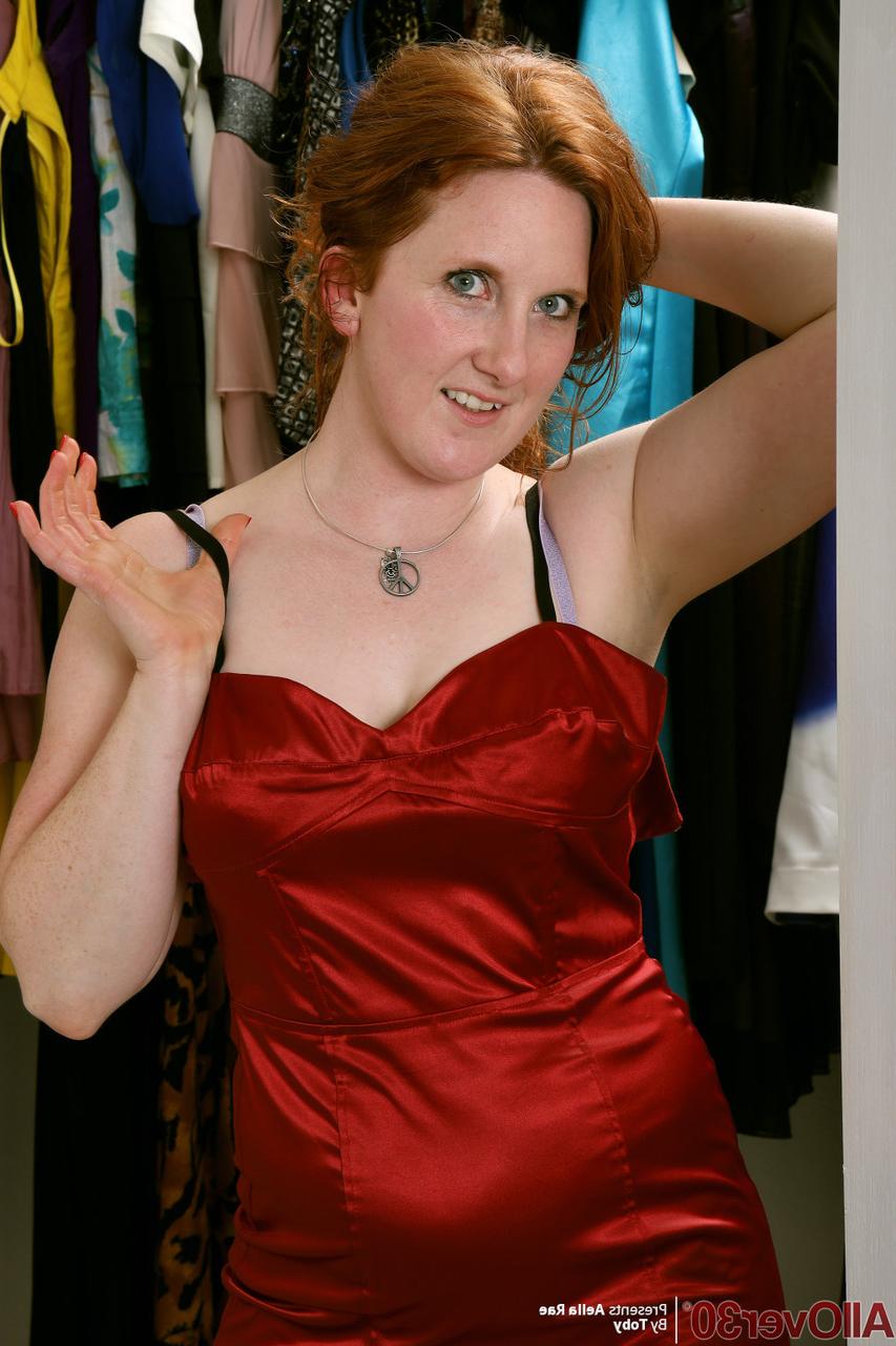 15P Over 30 redhead Aella Rae strokes her snatch after trying on lingerie