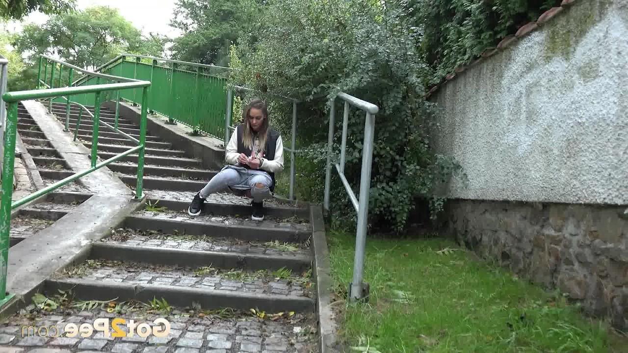 15P Naomi Benet gets caught with her jeans down while pissing on public steps