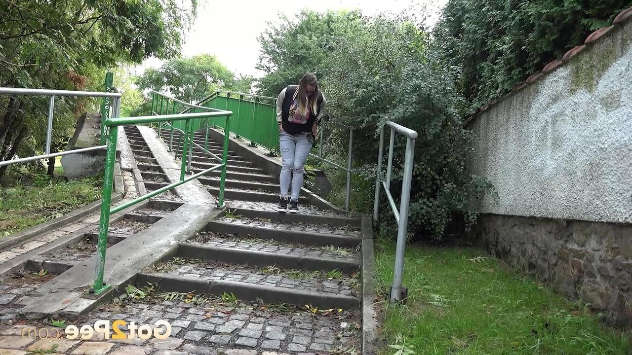 15P Naomi Benet gets caught with her jeans down while pissing on public steps