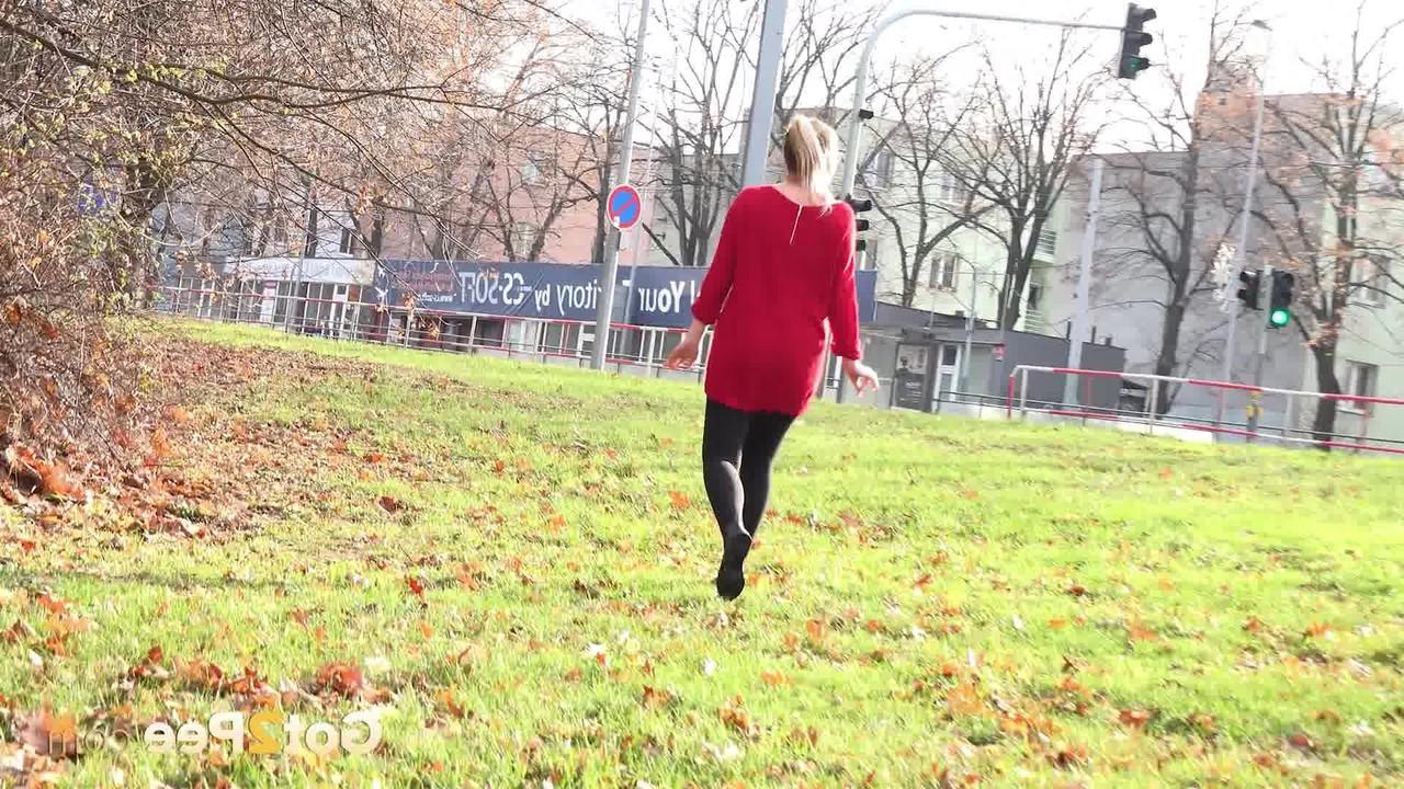 15P Caucasian chick Nikki Dream takes a badly needed pee near a hydro tower