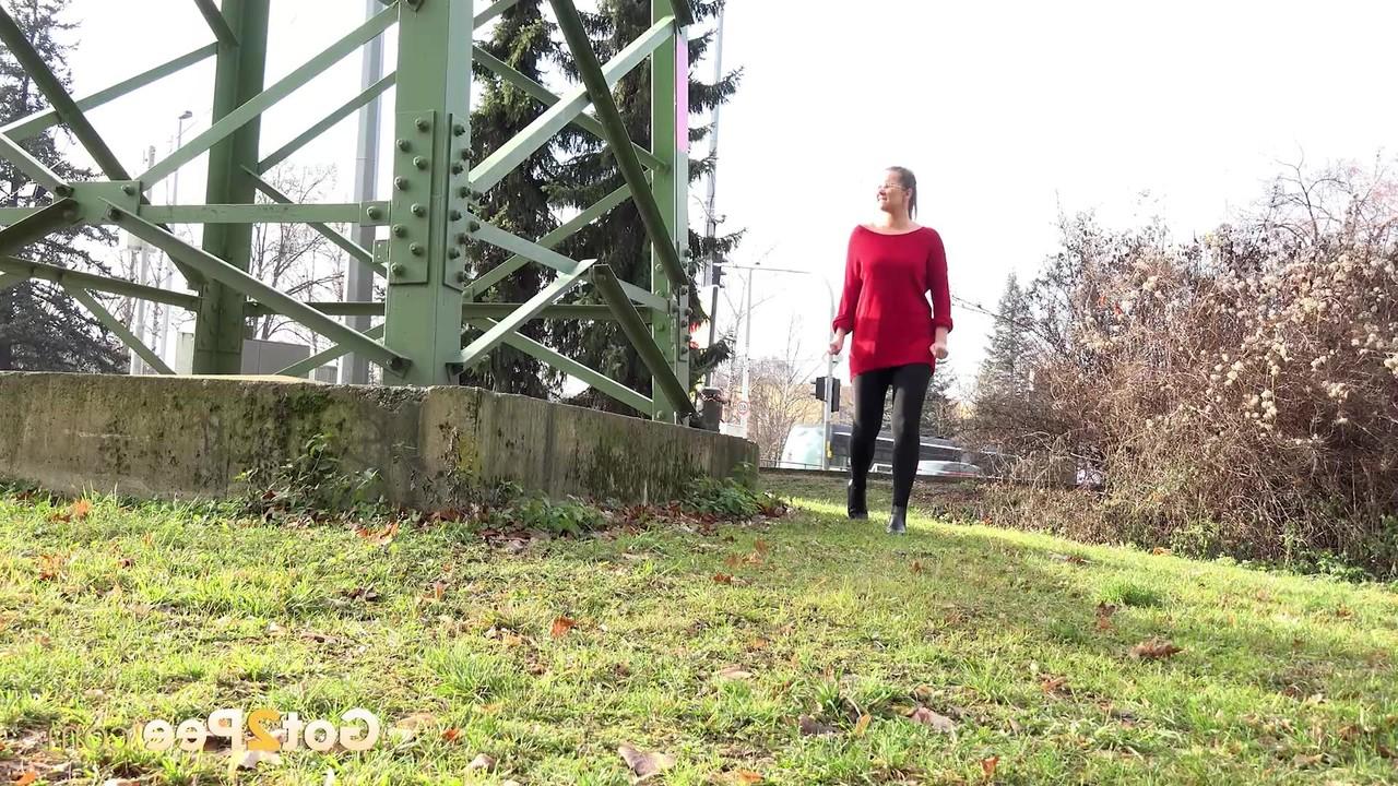 15P Caucasian chick Nikki Dream takes a badly needed pee near a hydro tower