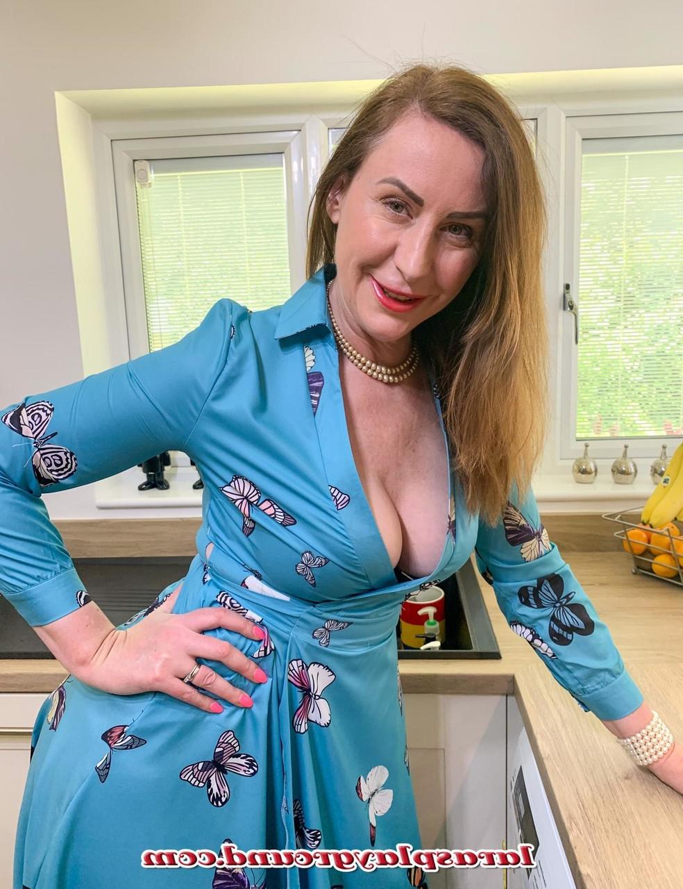 20P Curvy MILF Lara strips to her stockings, shows her big ass and masturbates