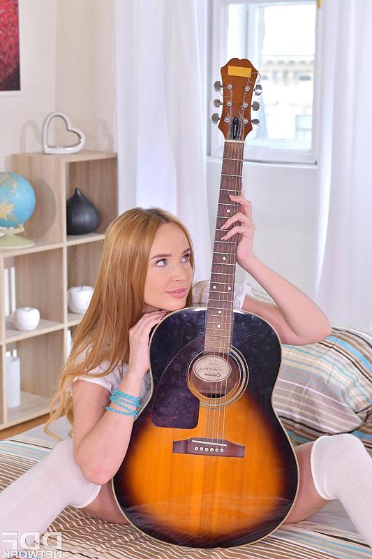 12P Adorable redhead Kaisa Nord plays guitar before pussy to mouth sex
