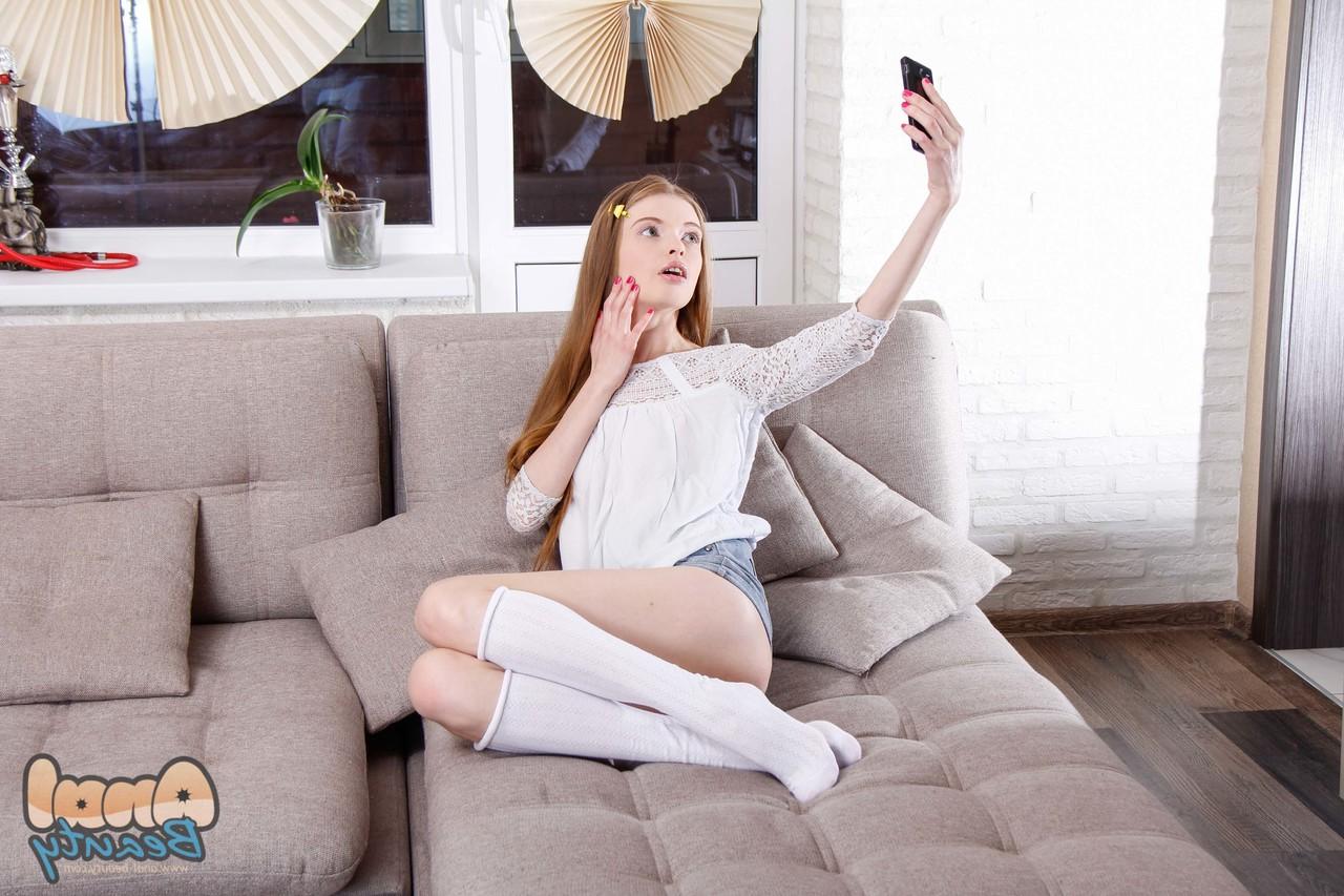 20P Russian beauty Adel Bye getting spooned on the sofa by her boyfriend