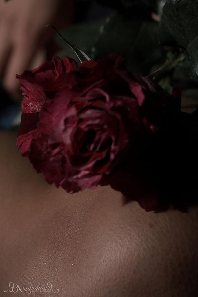 16P 18-year-old brunette Edison X holds a flower while posing in the nude