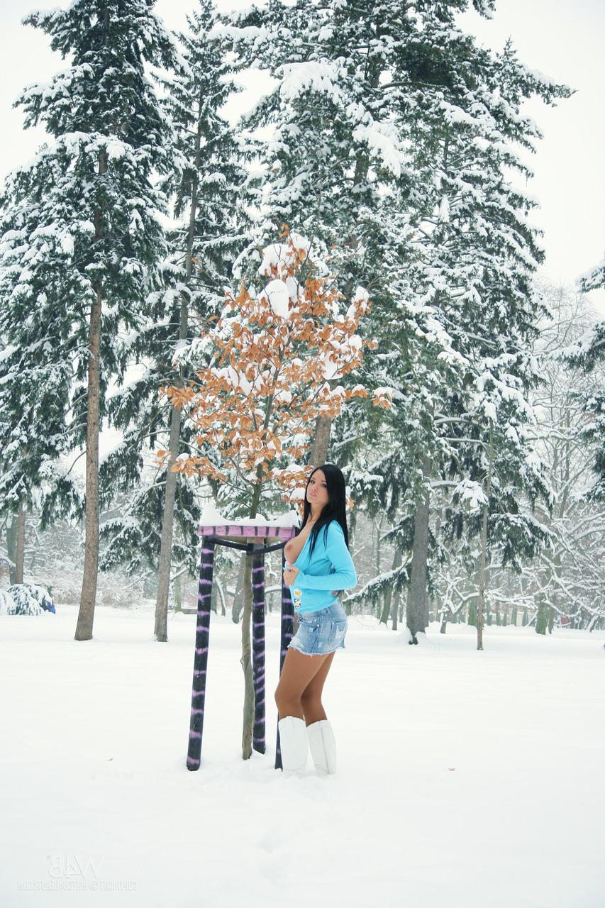 20P Teen with amazing titties Ashley Bulgari reveals her pussy in the snow