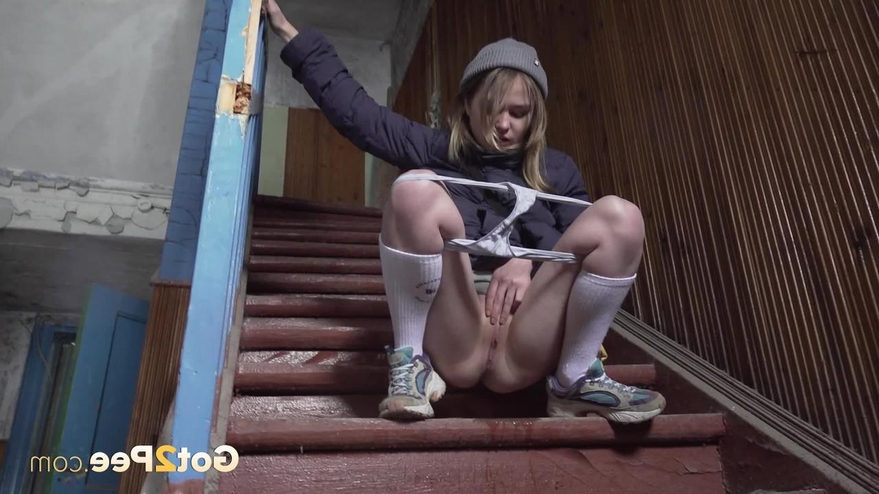 15P White girl Nastya squats on a flight of stairs while taking a piss