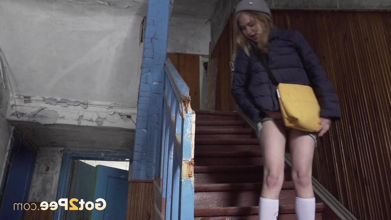 15P White girl Nastya squats on a flight of stairs while taking a piss