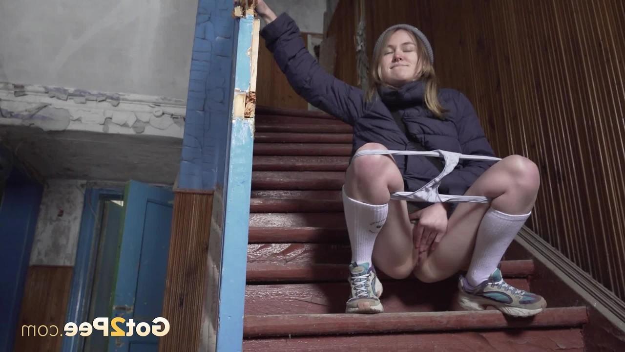 15P White girl Nastya squats on a flight of stairs while taking a piss