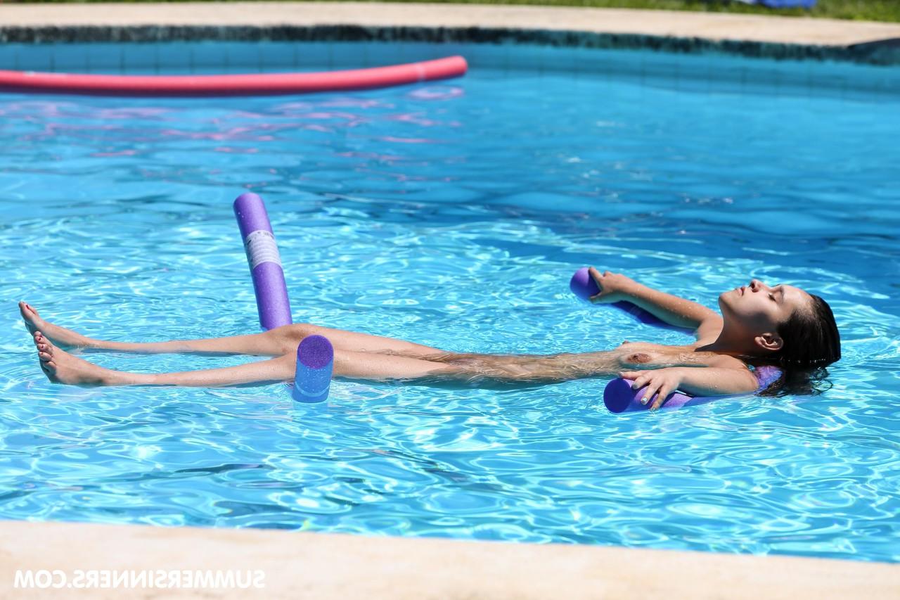 20P Redheaded Czech babe Chrissy Fox gives head during a naked swimming session