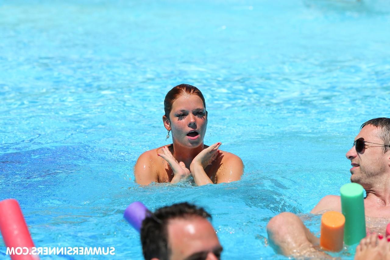 20P Redheaded Czech babe Chrissy Fox gives head during a naked swimming session