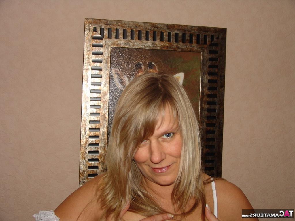 16P Blonde MILF Sweet Susi models lingerie before getting jizz on her belly & cunt