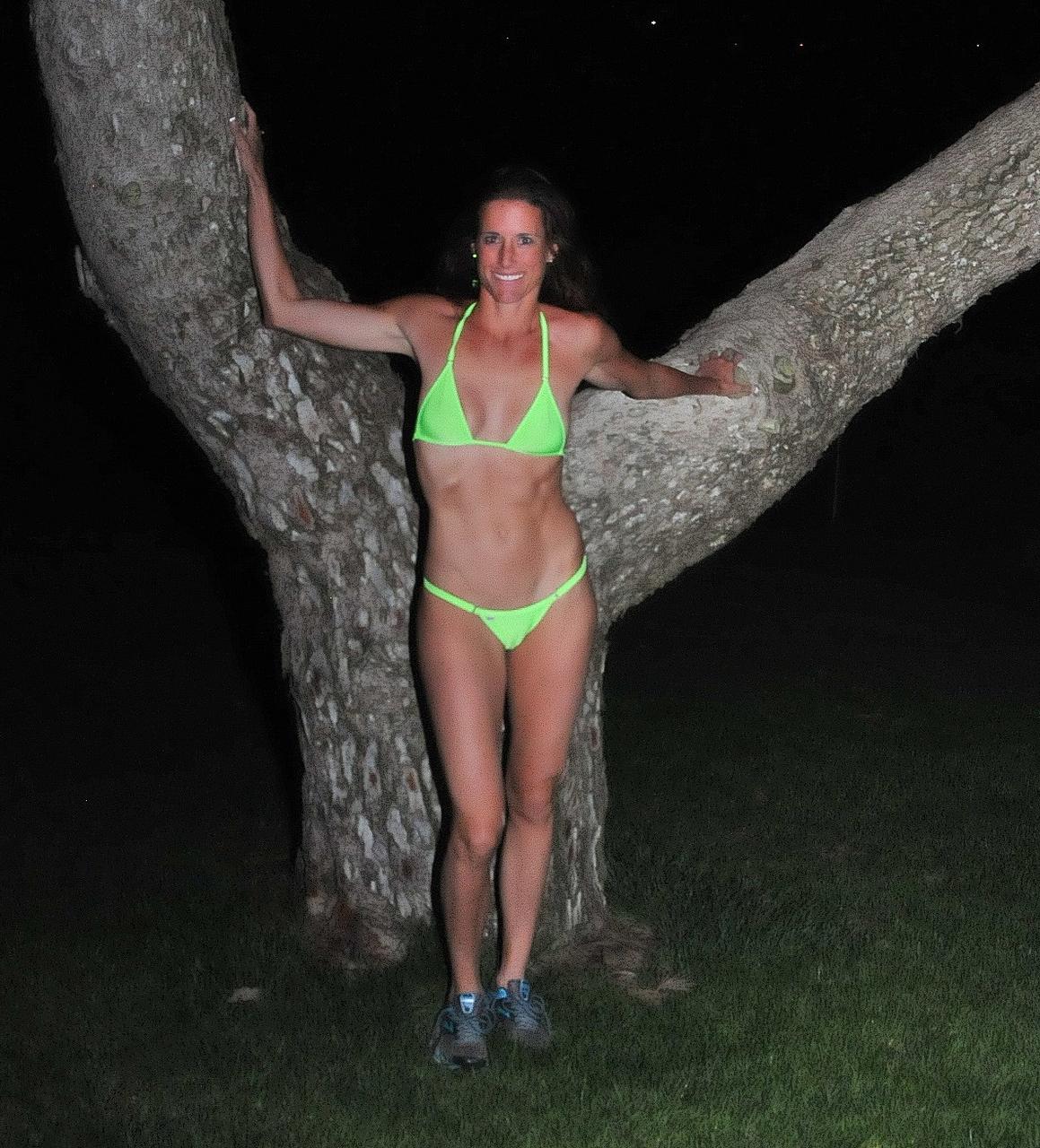 20P Skinny MILF Sofie Marie flashes her tits while teasing in a bikini outdoors