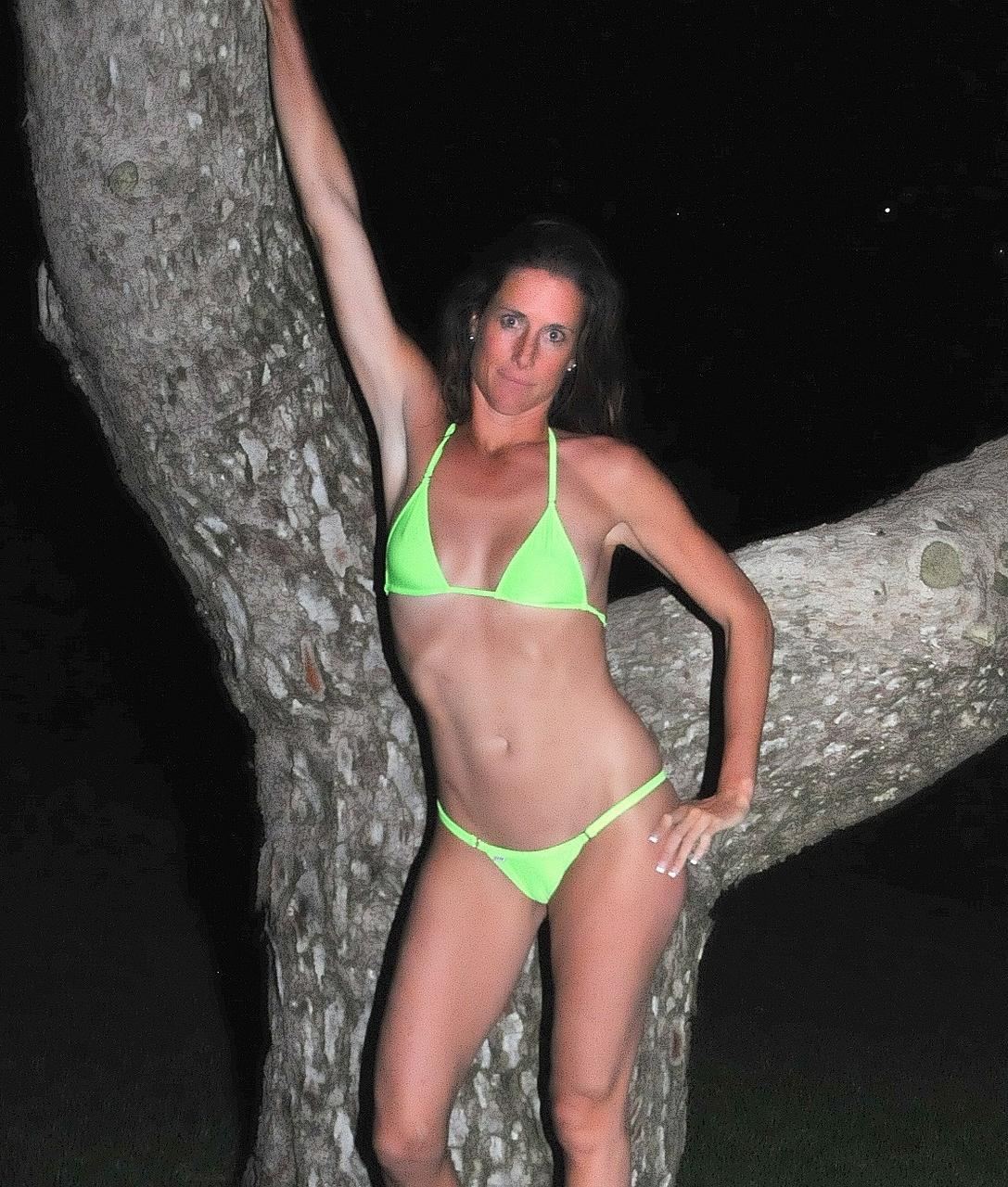 20P Skinny MILF Sofie Marie flashes her tits while teasing in a bikini outdoors