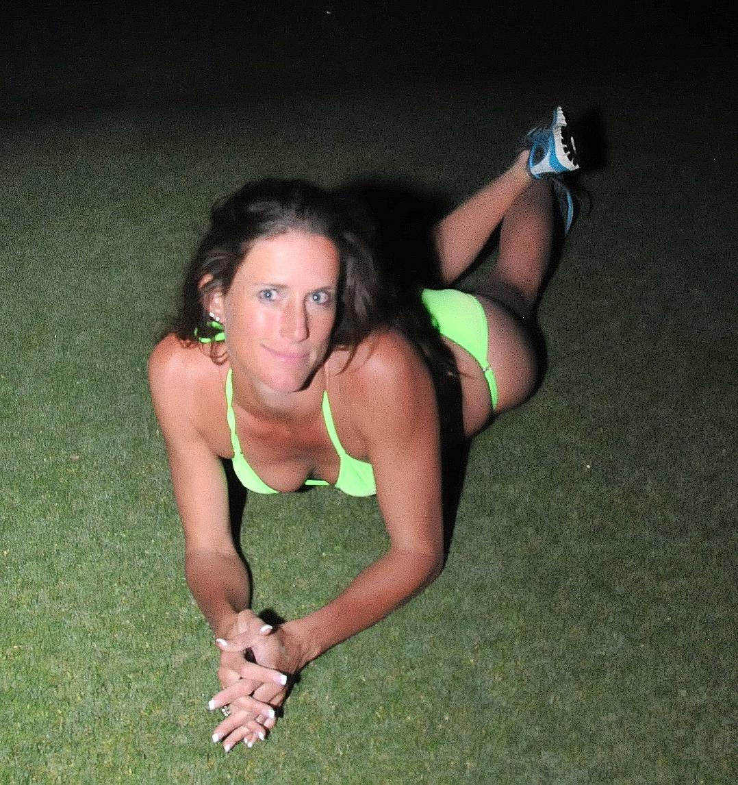 20P Skinny MILF Sofie Marie flashes her tits while teasing in a bikini outdoors