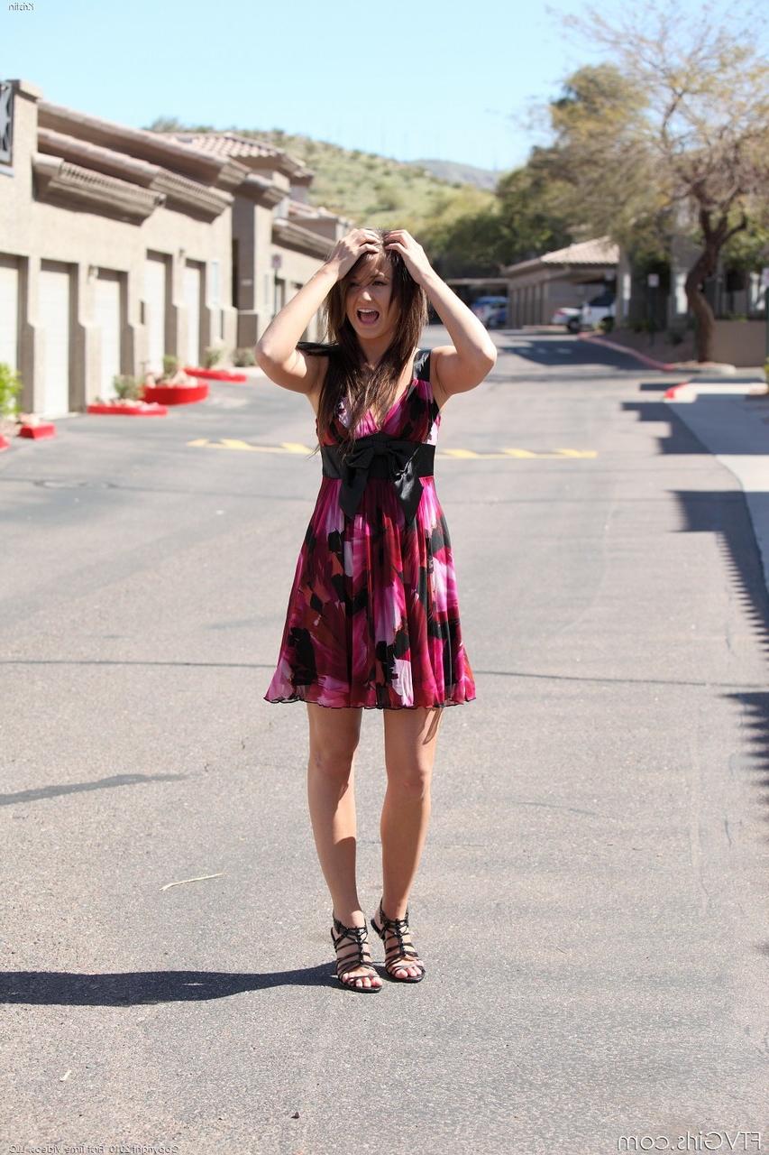 20P Pretty American babe Kristin stripping naked and posing in public