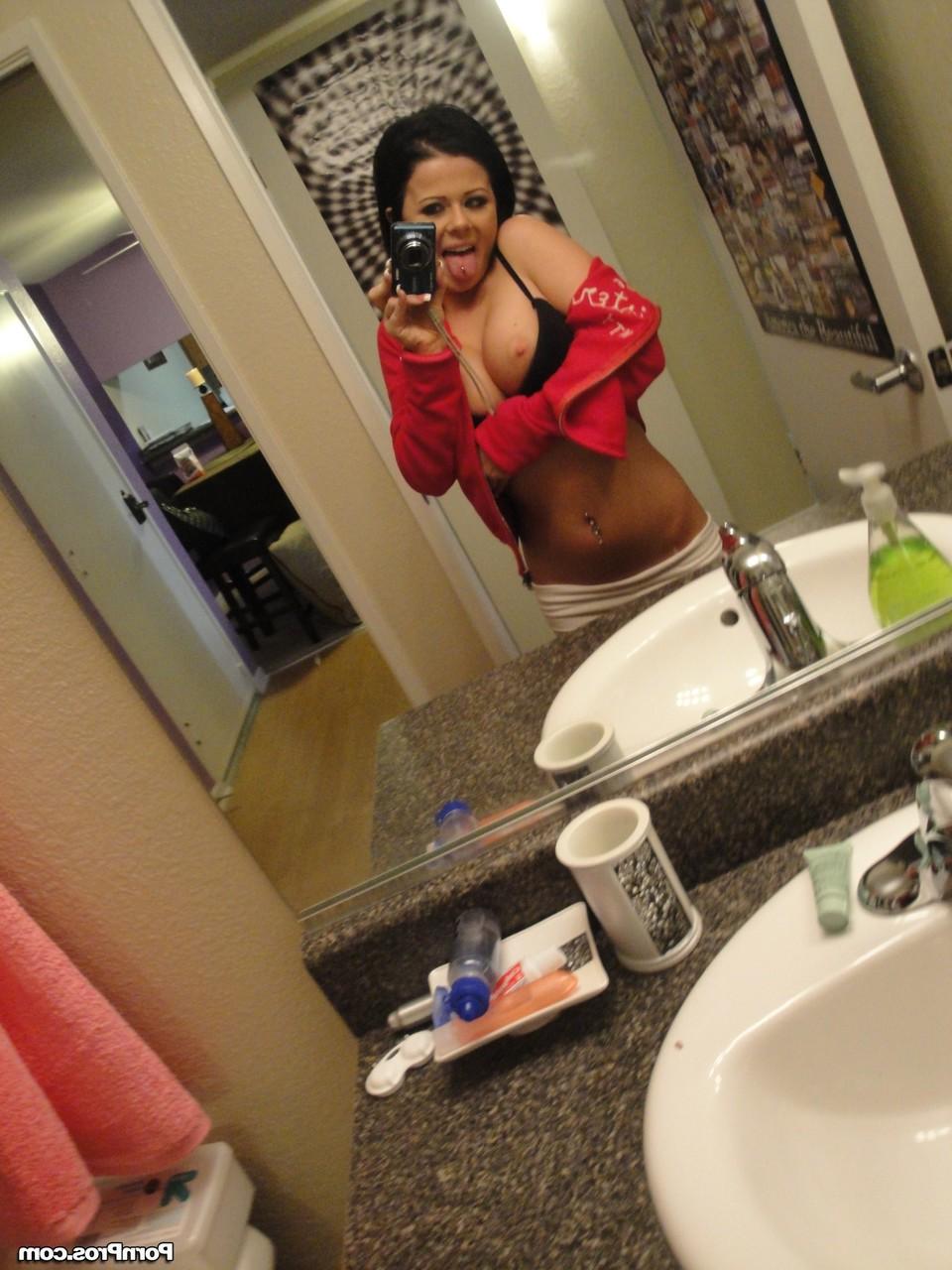 12P Black haired babe with massive jugs stripping and teasing with some nudes