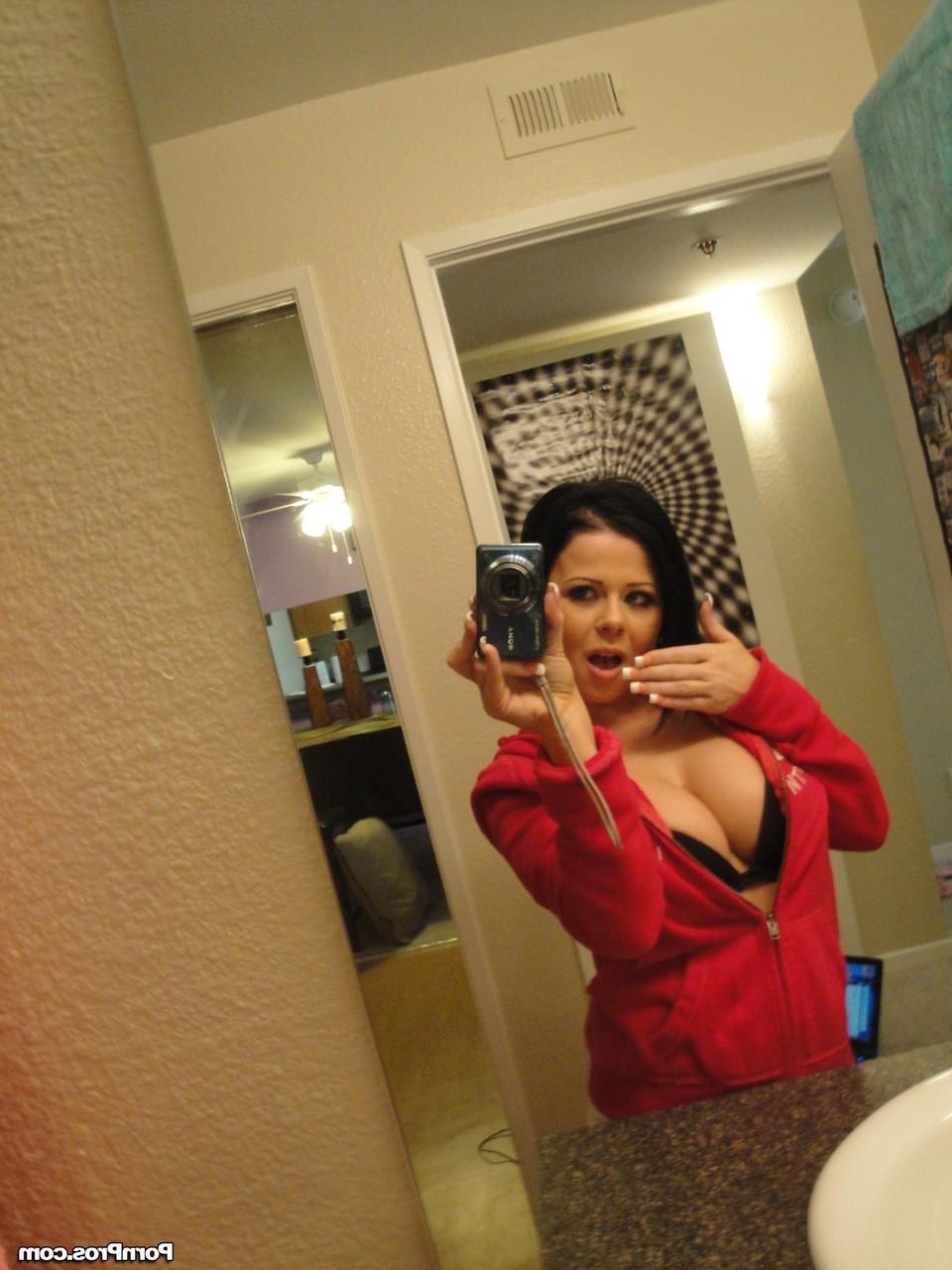 12P Black haired babe with massive jugs stripping and teasing with some nudes