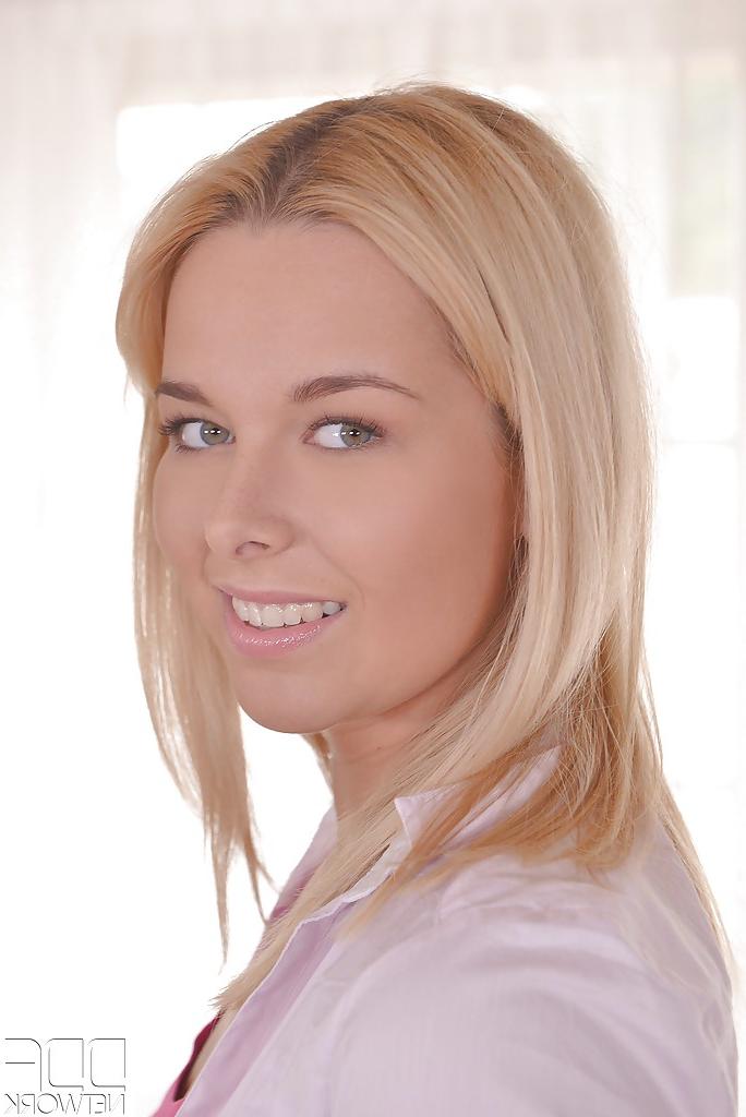 16P Beautiful blond babe Nikki Dream removing blue jeans to spread smooth pussy