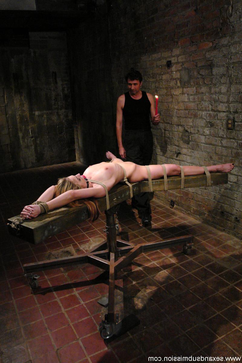 17P Blonde chick Riley Shy endures hot wax treatment while restrained