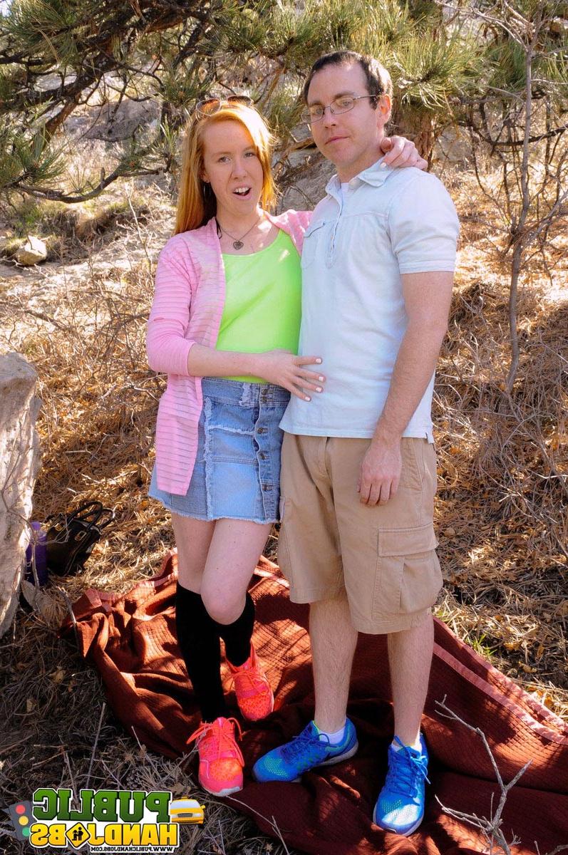 20P Naughty redhead Kierra Wilde gives her boyfriend an outdoor handjob