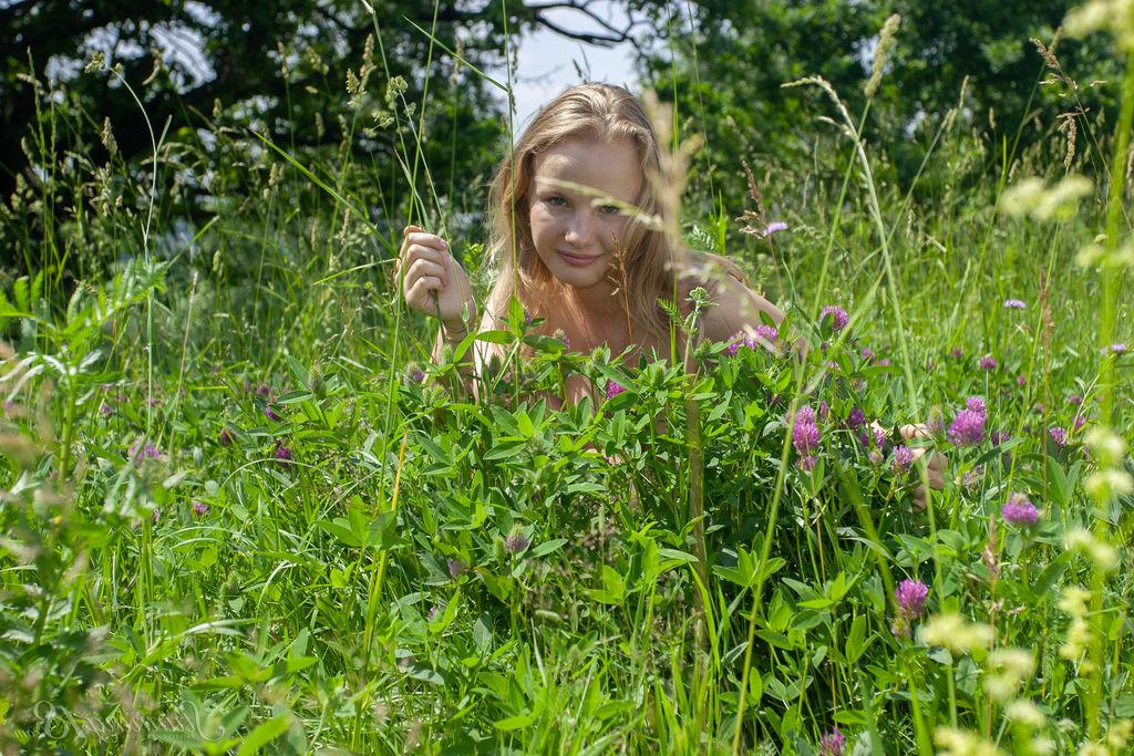 16P 18 year old blonde Kate models totally naked while in a field