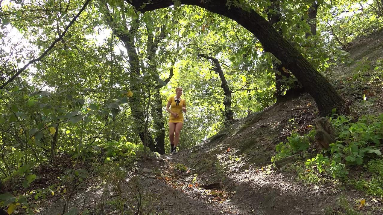 15P Redheaded girl Chrissy Fox takes a badly needed piss while hiking in the woods