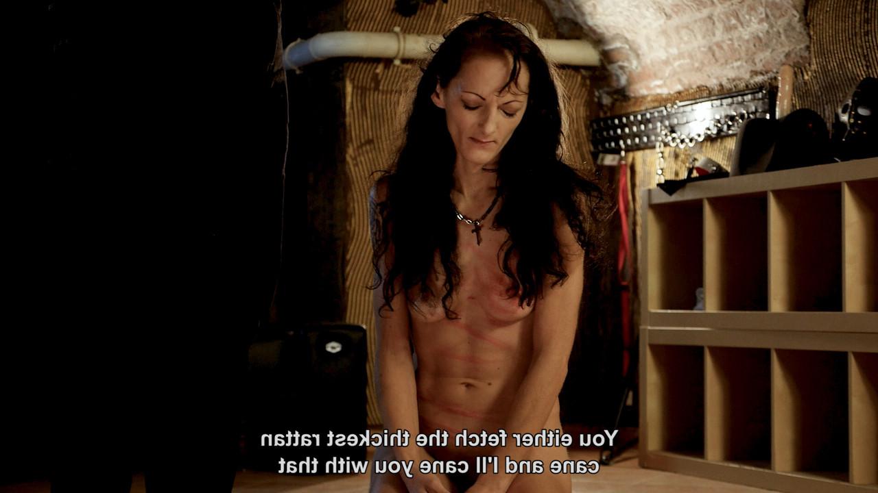 20P Naked brunette in high heels endures corporal punishment in a wild BDSM scene