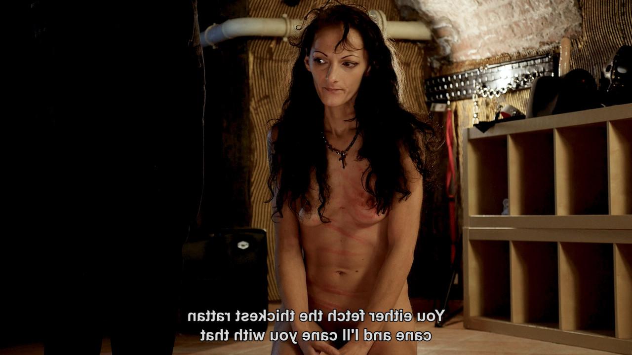 20P Naked brunette in high heels endures corporal punishment in a wild BDSM scene