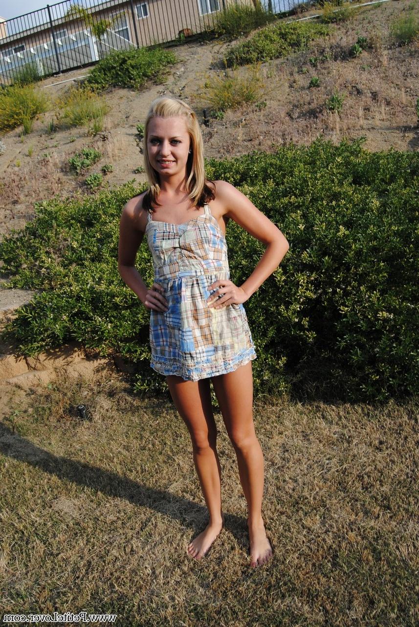 16P Blonde amateur Tiff stands naked in a yard while showing her cute butt