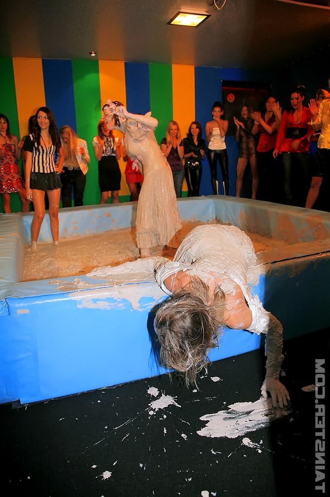 16P Seductive fetish gals with petite tits are into messy mud wrestling