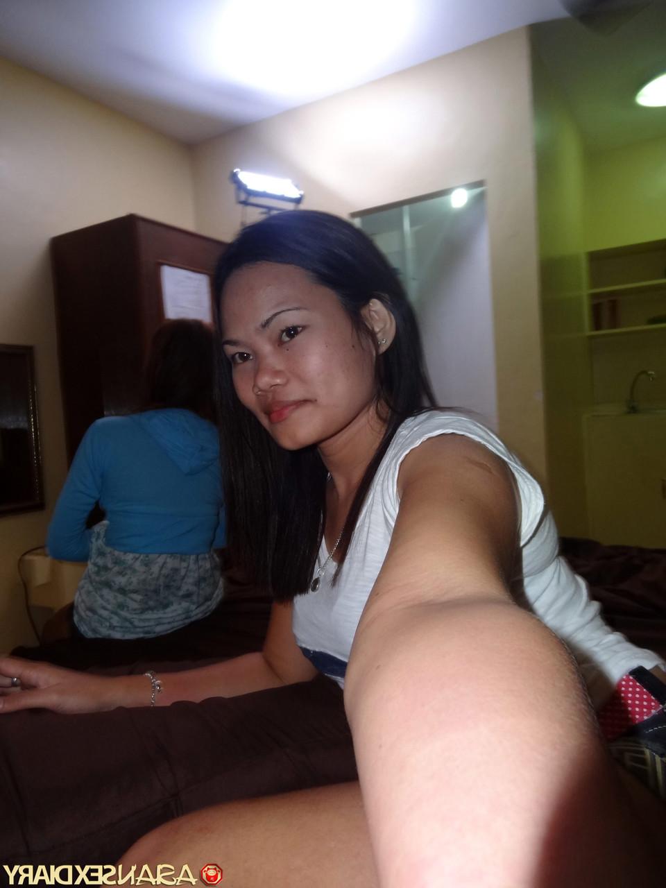 15P Asian girls Irish and Leann get completely naked atop a bed
