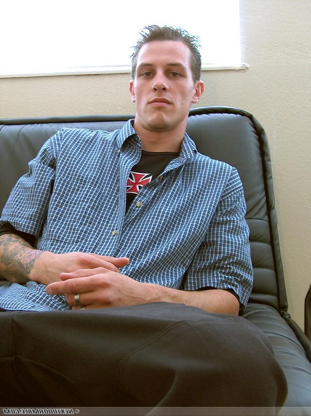 20P Slim brunette twink Dan removes his shirt and masturbates on the sofa