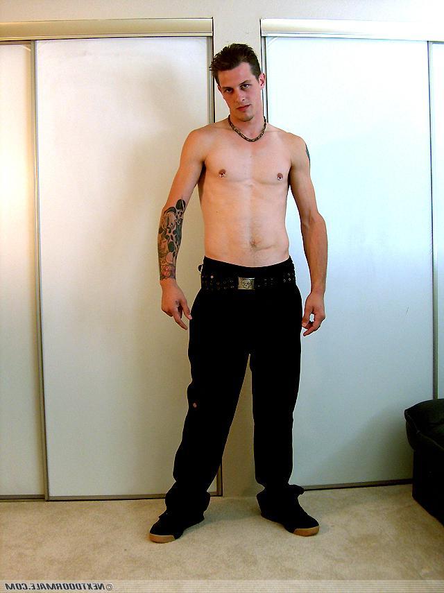 20P Slim brunette twink Dan removes his shirt and masturbates on the sofa