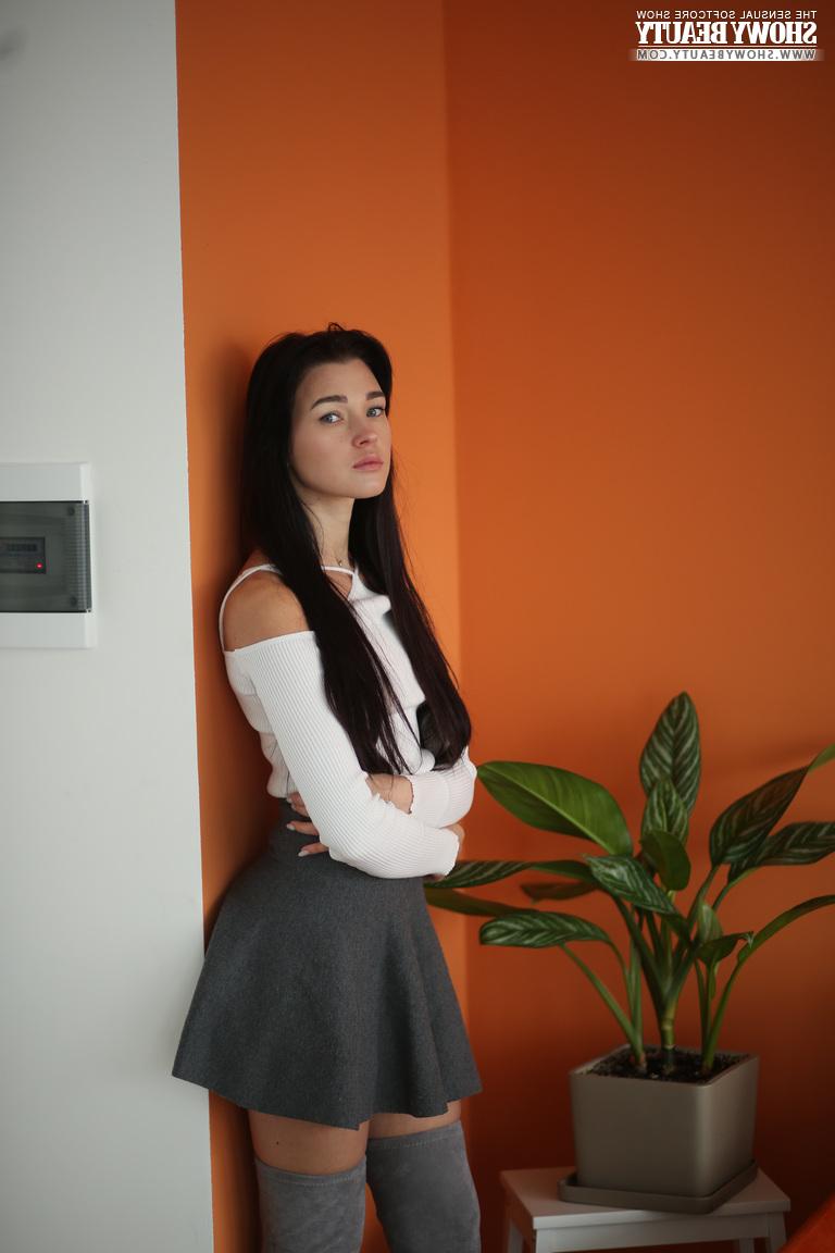 20P Brunette teen Vlada removes over the knee suede boots while going bare naked