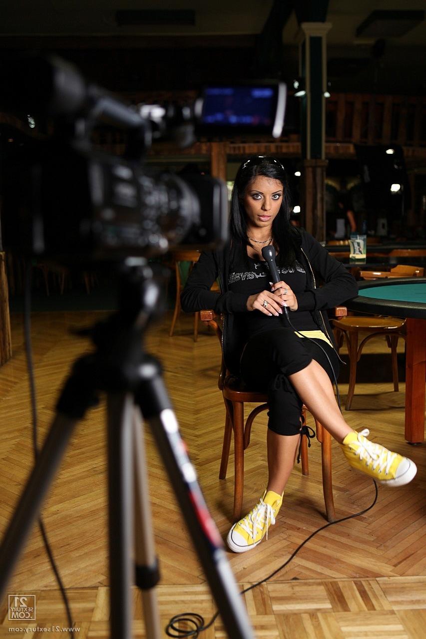 17P Hungarian stunner Kyra Black tease with a microphone during an interview