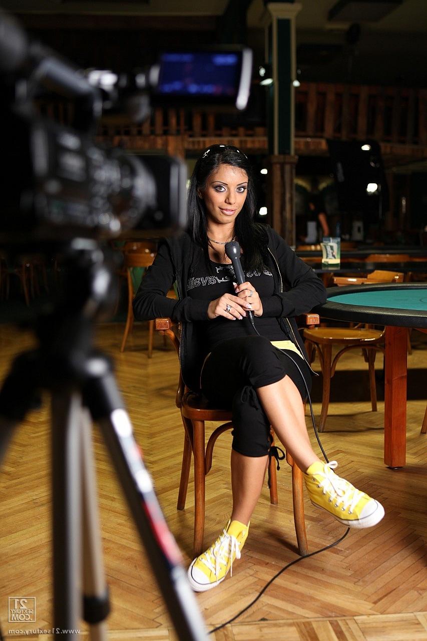 17P Hungarian stunner Kyra Black tease with a microphone during an interview