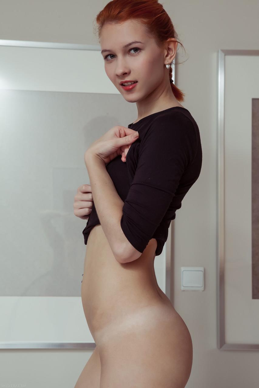 20P Redheaded babe with a pretty ass Ambre unveils her slim body in a solo