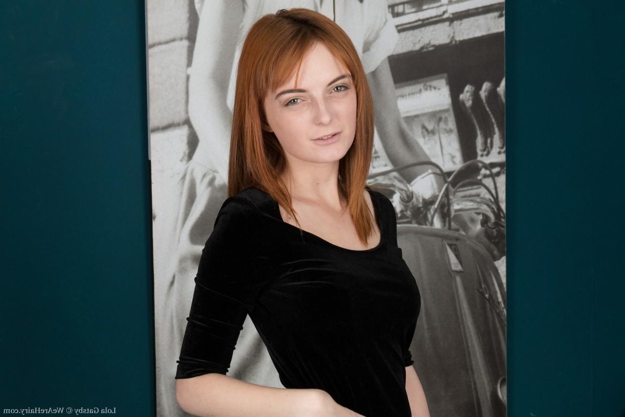 16P Petite UK redhead Lola Gatsby spreads her natural pussy after undressing
