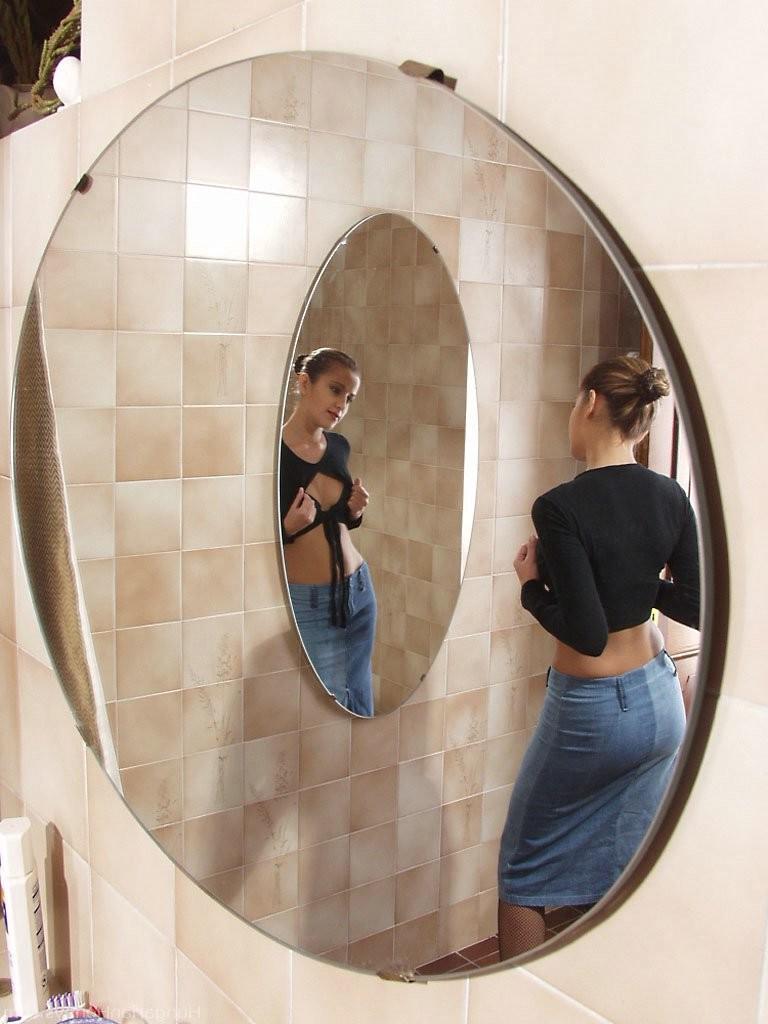 20P Sexy MILF Brittany Stone gets rid of her clothes & lingerie in the mirror