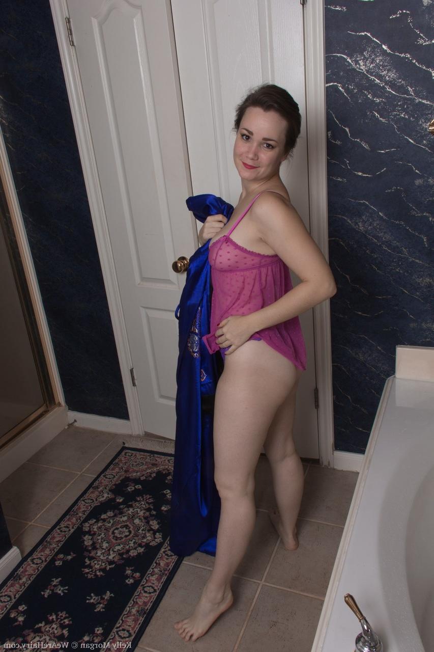 20P Petite brunette Kelly Morgan washes her hairy cunt and natural boobs
