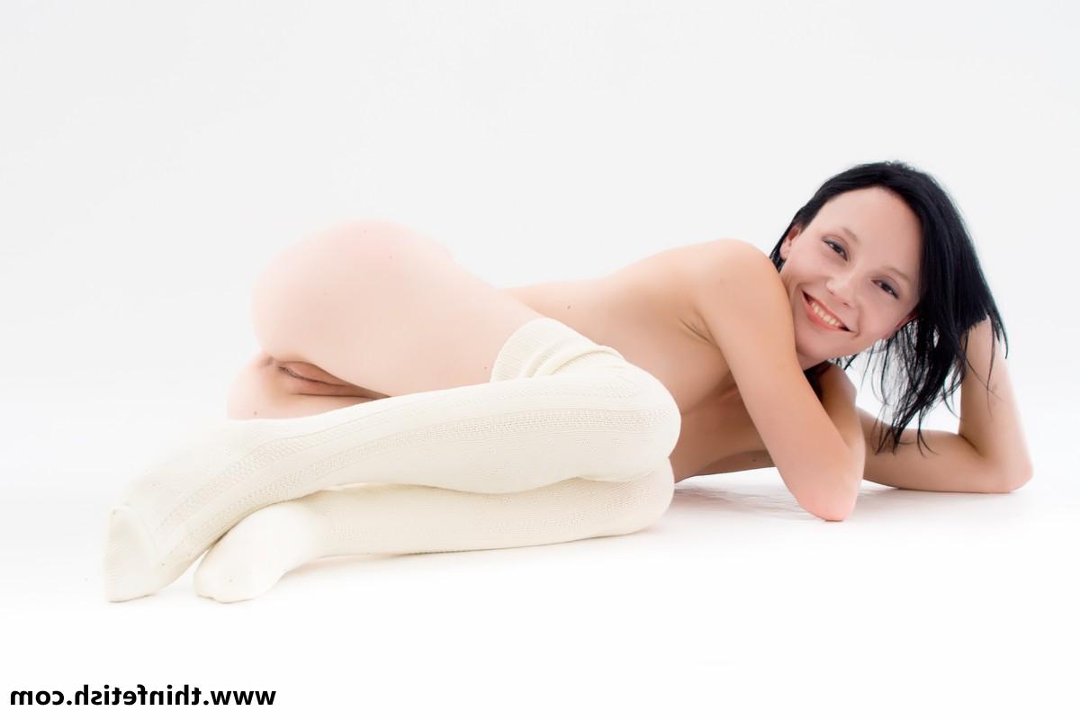 16P Skinny brunette displays her flexibility while nude in white stockings