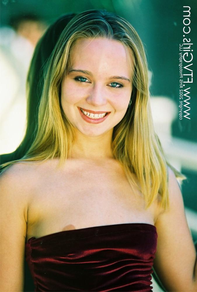 20P Glamorous babe Lily flashes her small tits and her shaved pussy