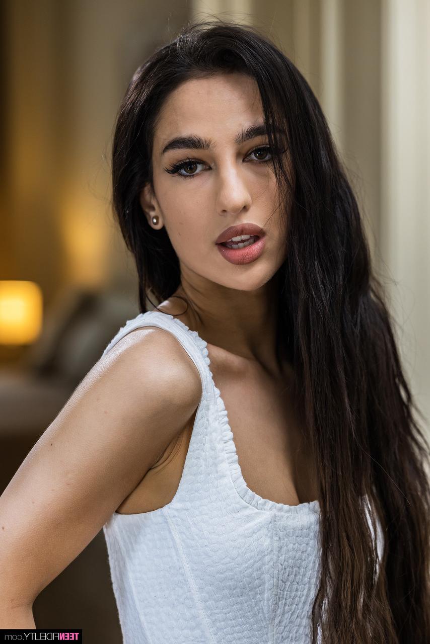 20P Teen hottie Kama Oxi undressing and touching her hot body in a solo