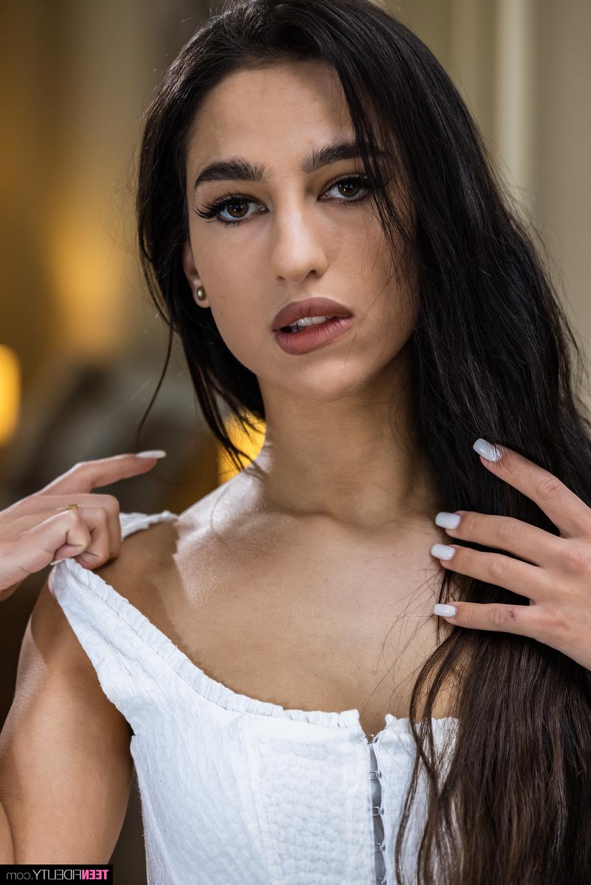 20P Teen hottie Kama Oxi undressing and touching her hot body in a solo
