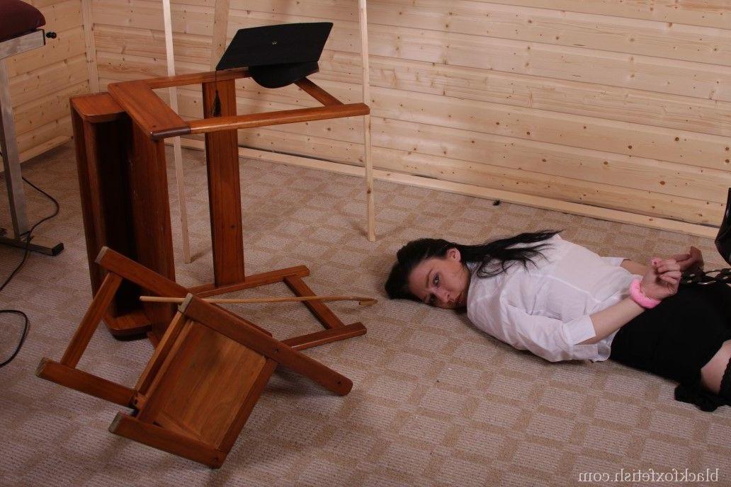 16P History teacher places herself into bondage prior to caning a female student