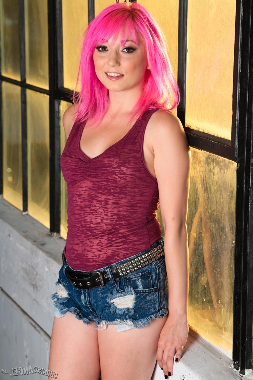 17P Pink haired cutie Moretta Coxxx taking off her clothes and showing sexy ass