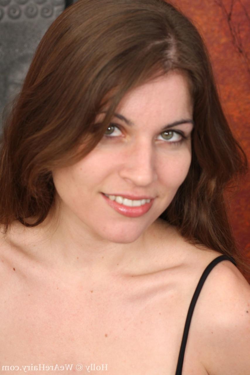 10P Solo model with small breasts and bare legs takes off clothes to bare her muff