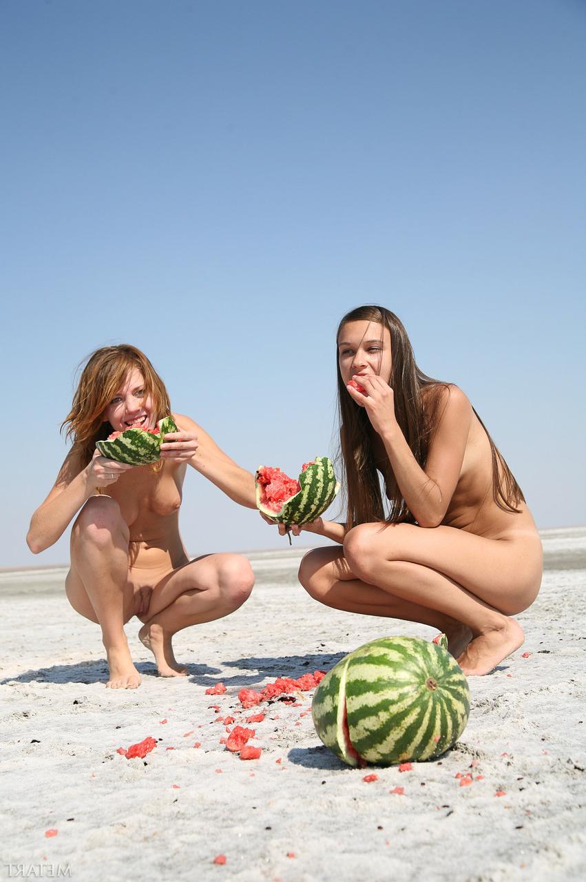 20P Teens Freya A & Itna A play with watermelons while posing naked on the beach